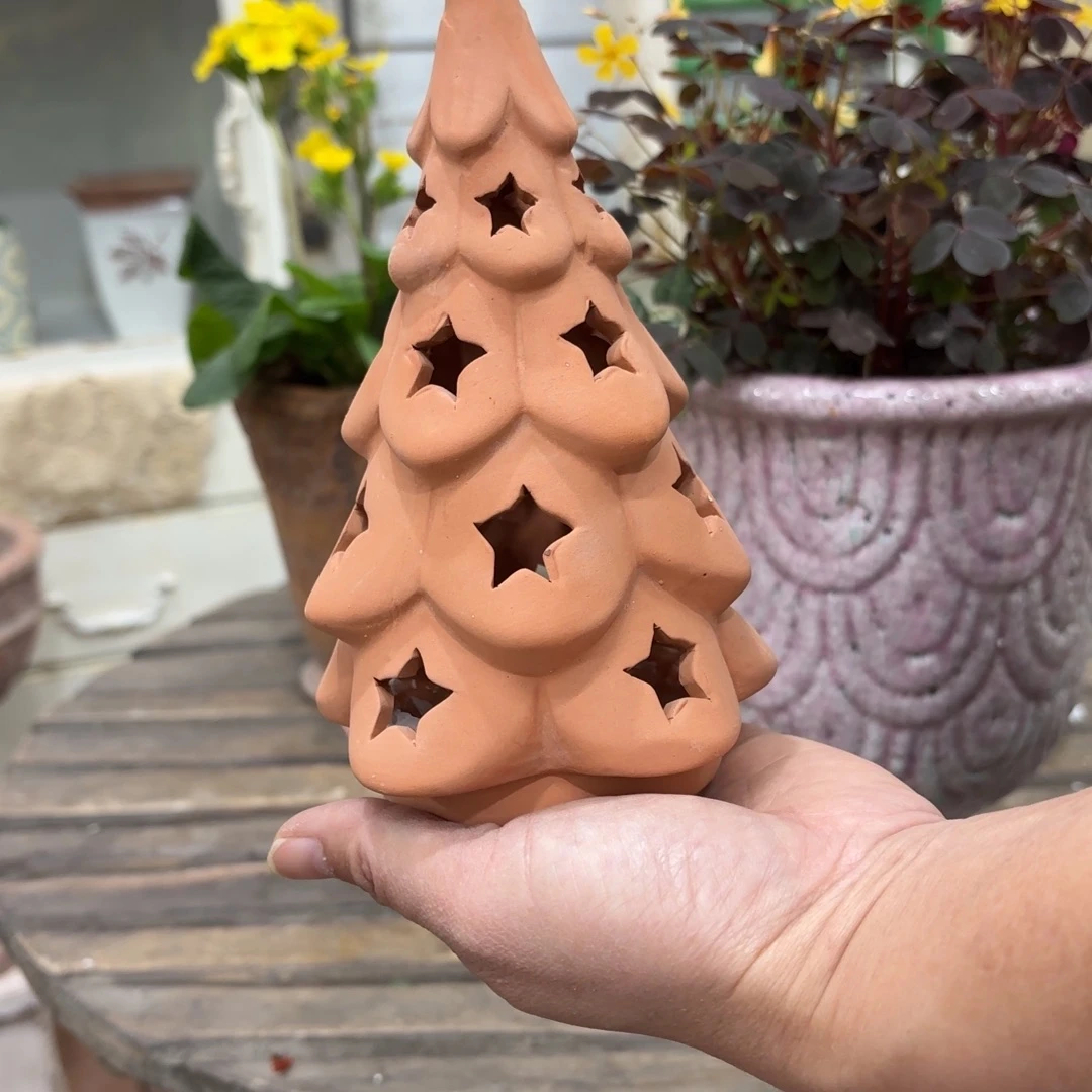 许纯的花房镂空树风灯