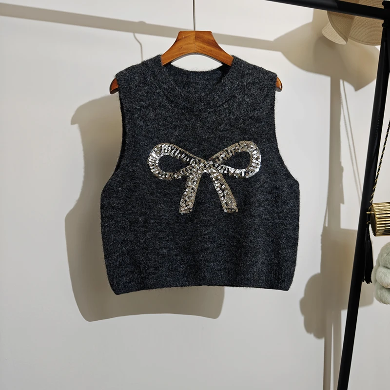 蝴蝶结重工亮片针织马甲女秋冬新款背后纽扣无袖圆领毛衣背心外穿