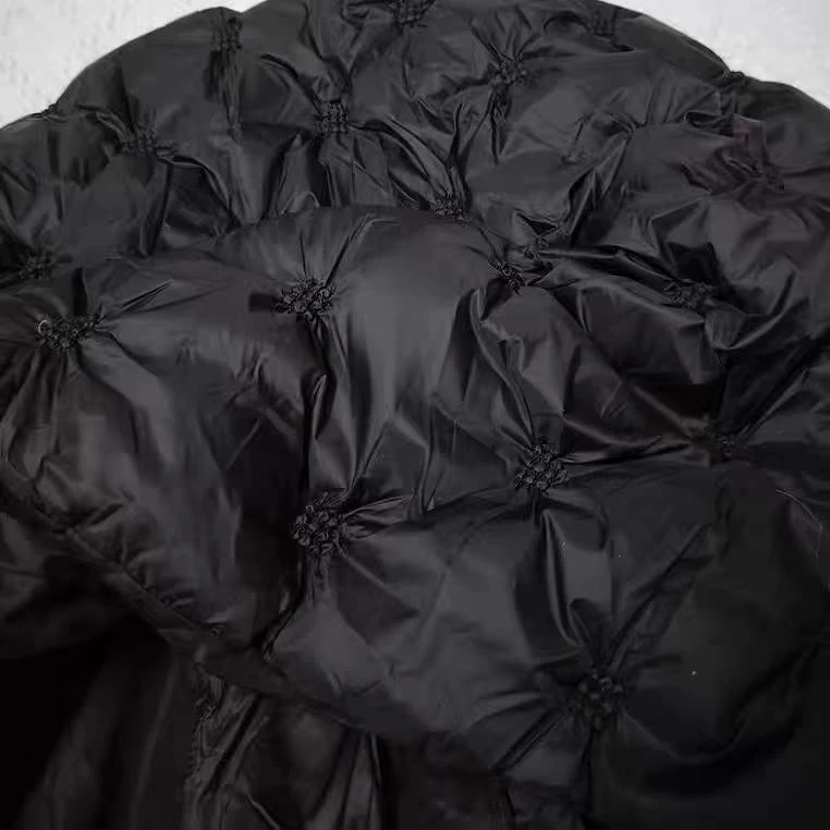 绣花三合一羽绒服面料