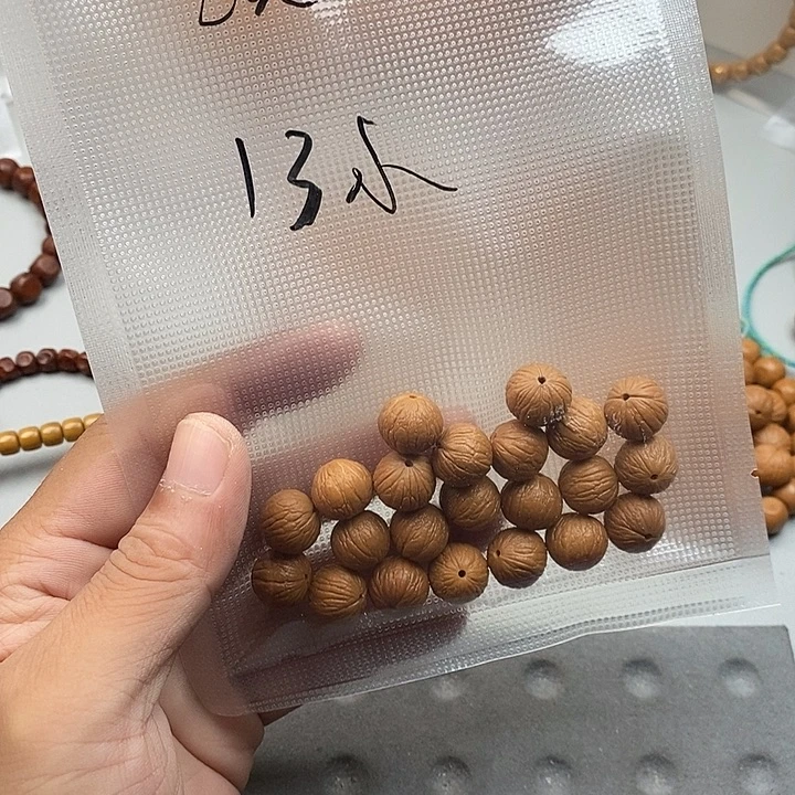 淡***言猴头核桃吊坠凤羽手持
