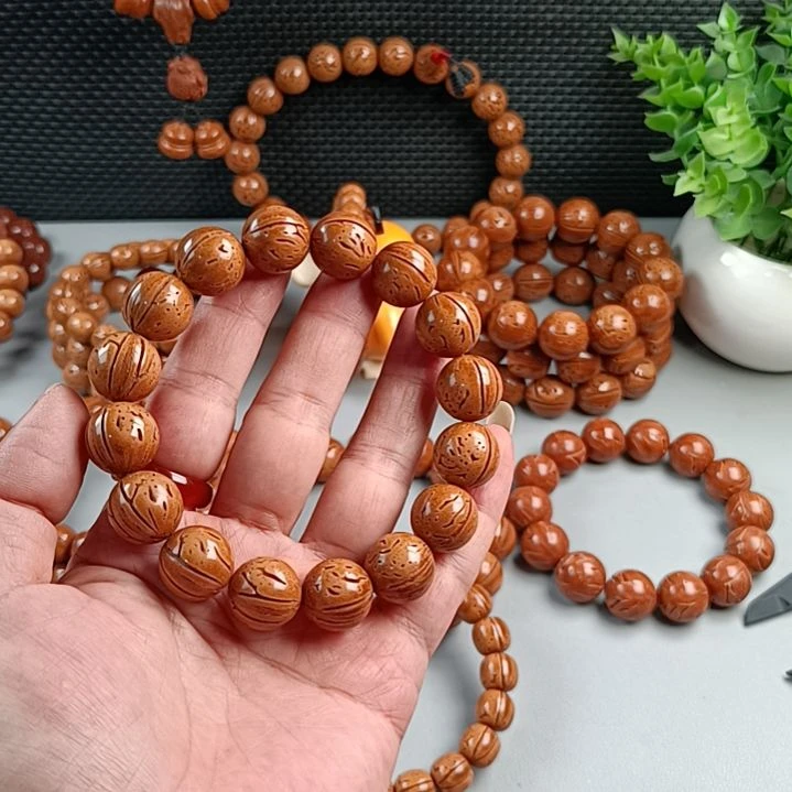 手串桃核铁籽黄皮15