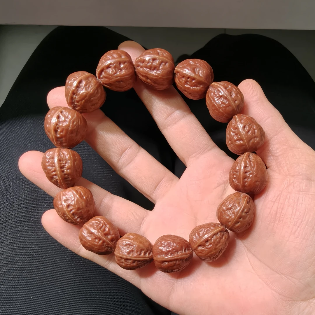 17.5mm橘皮正三角桃心核桃手串