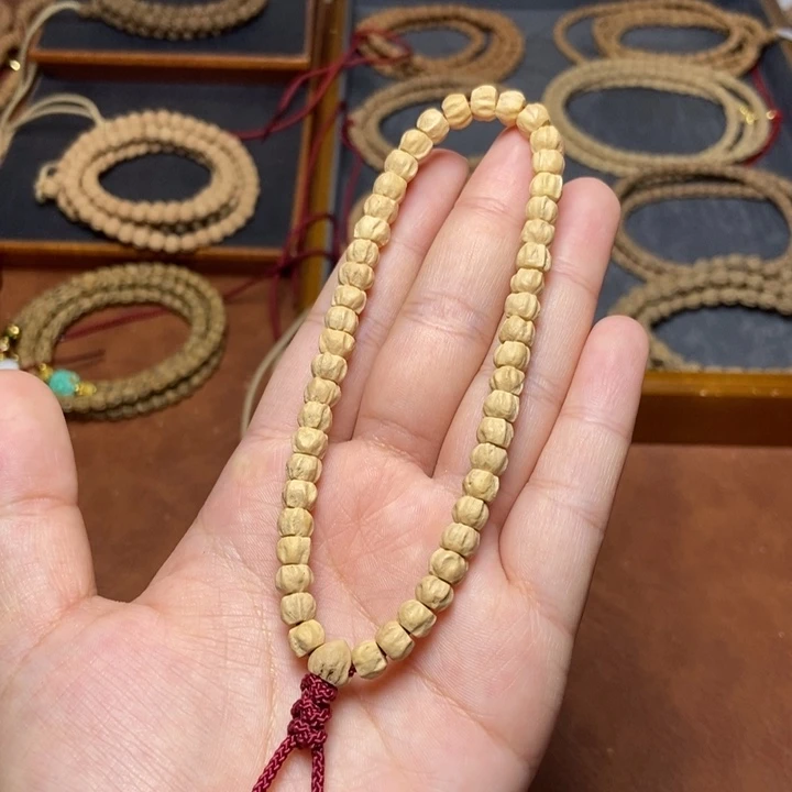 柏香籽/百香籽吊坠手持