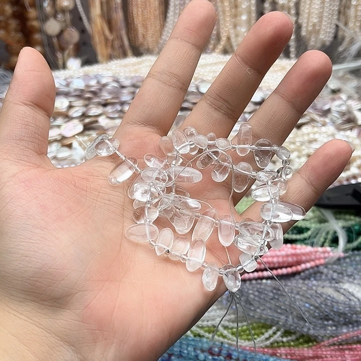 未镶嵌玛瑙/玉髓珠宝半成品一条白水晶侧孔长牙