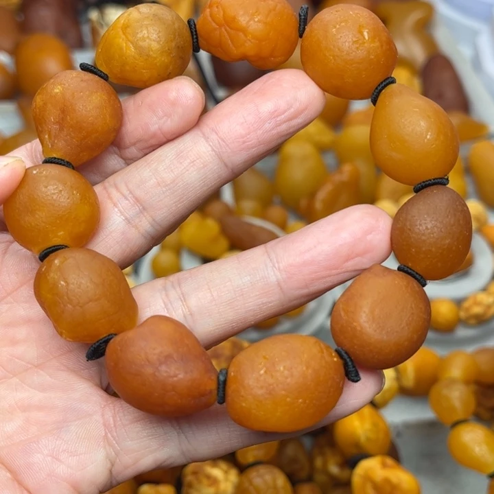 3***6琥珀未镶嵌裸石天然蜜蜡海漂手串
