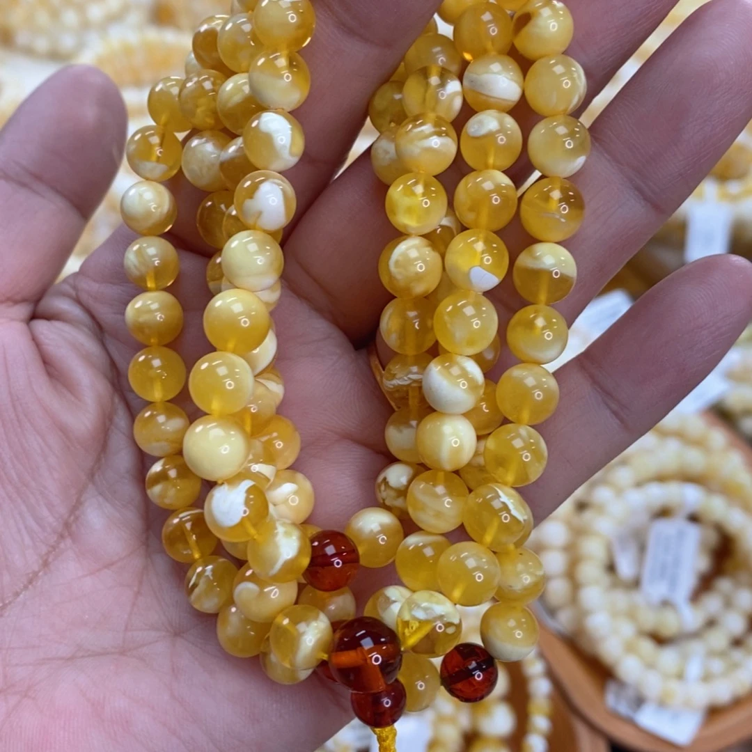 咦***炒琥珀未镶嵌手链7.7m金白虎皮108