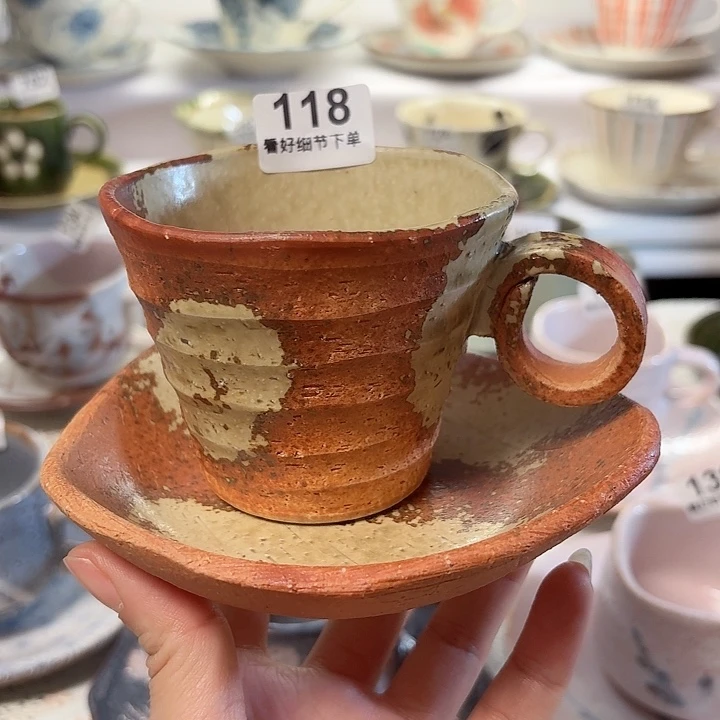 瓷片信勒差几风咖啡杯？