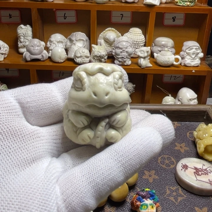 岁***好非金属皮质配饰鹿角雕刻恐龙