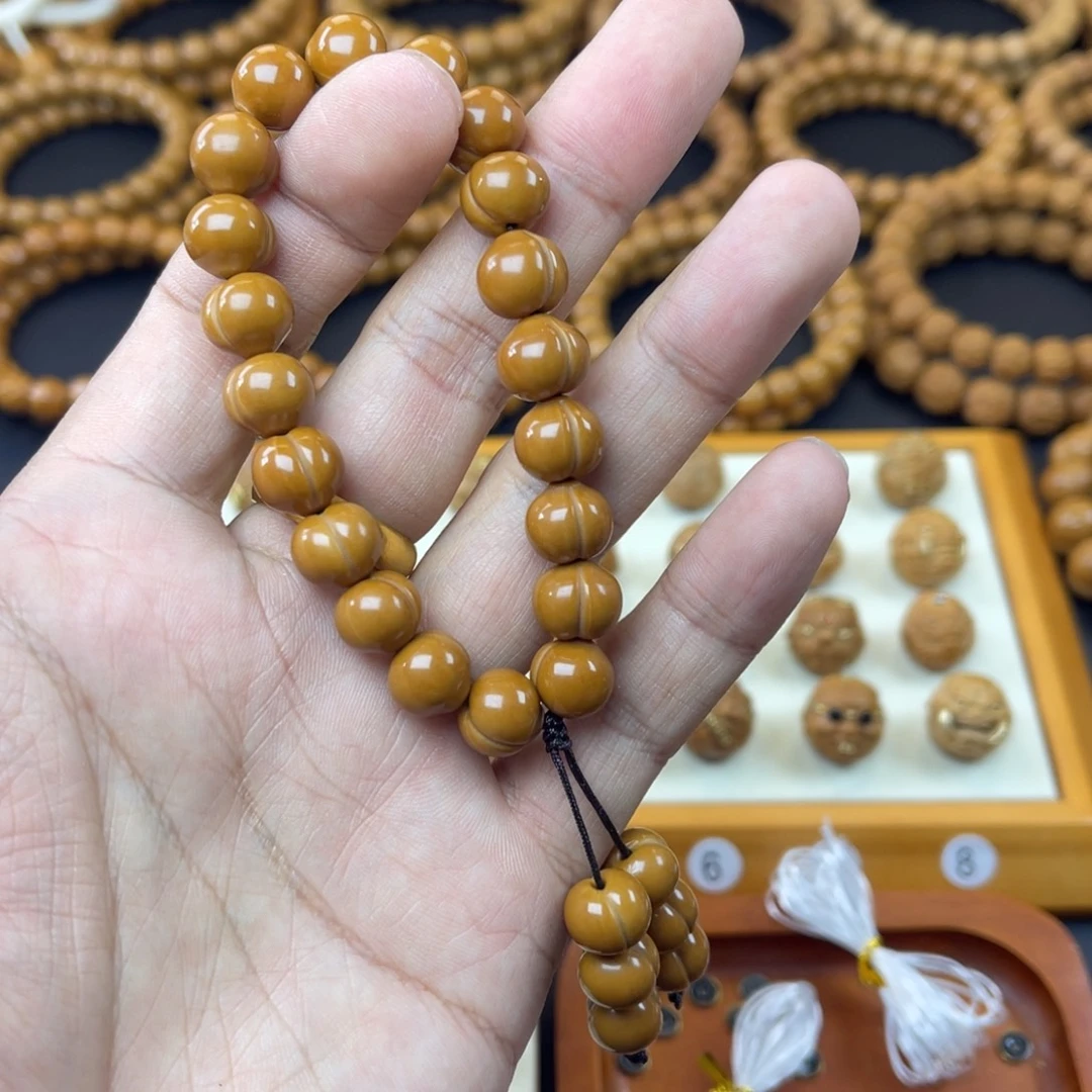 吴***闹吊坠猴头核桃屁桃