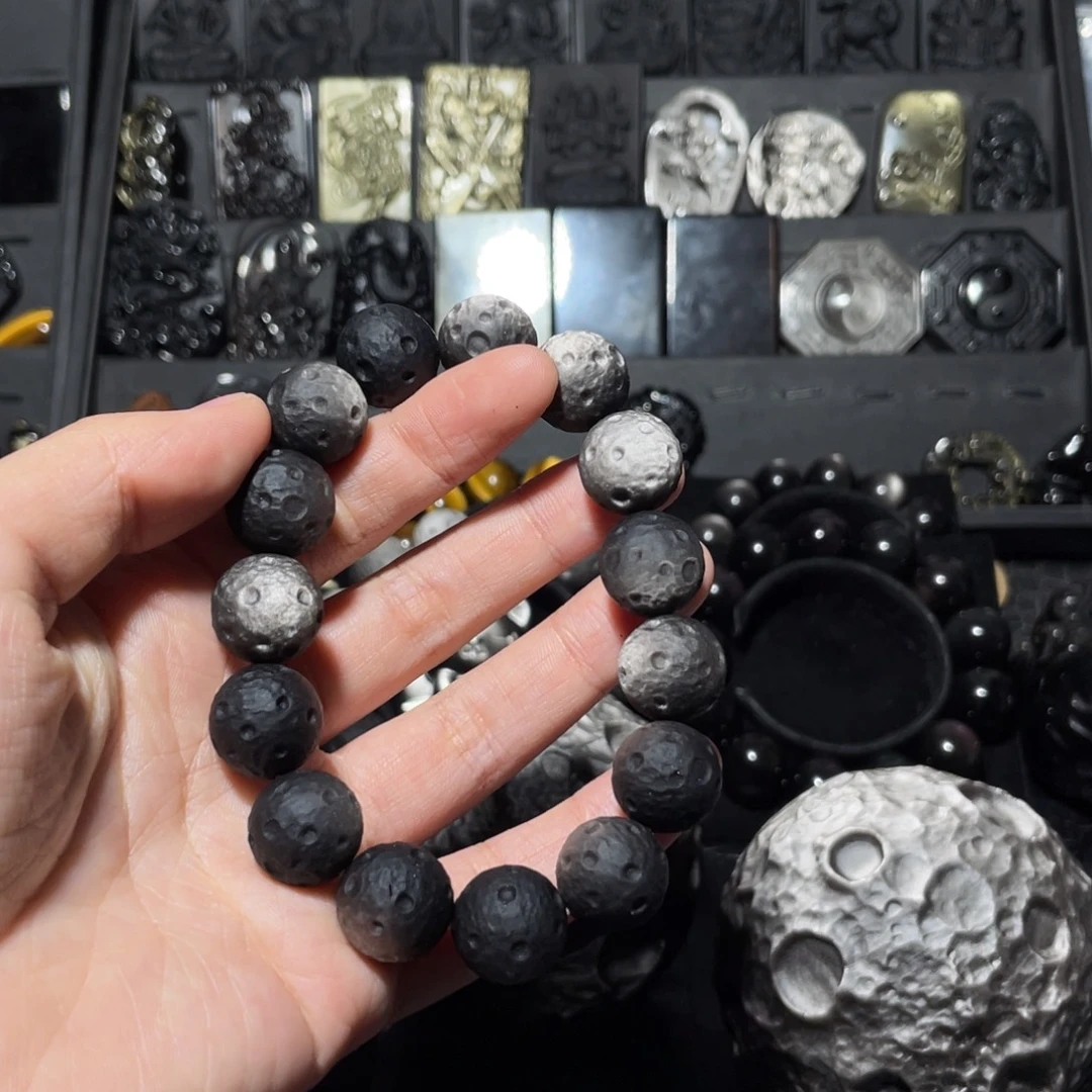 甲***丁黑曜岩未镶嵌珠宝奇石