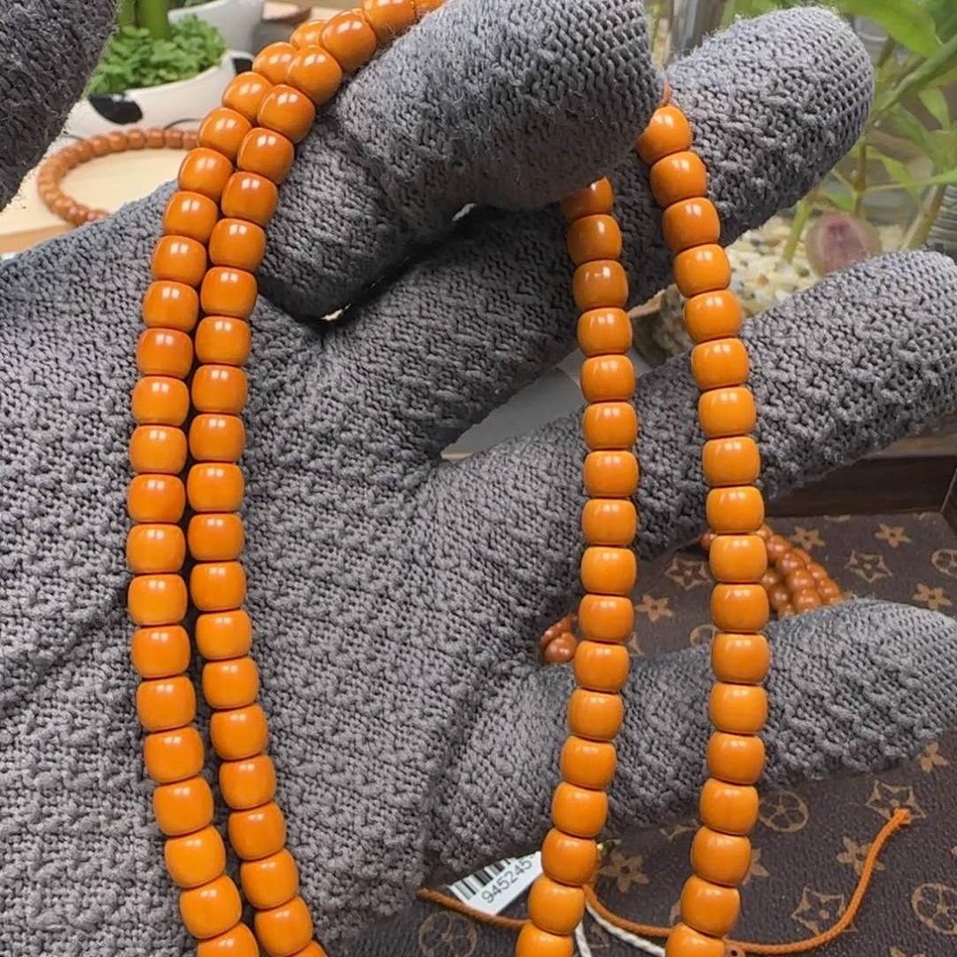 橄榄核吊坠老挝6.7mm三花108