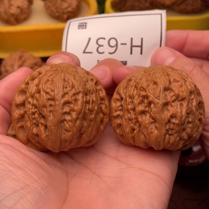 桃核把件铁锤43….