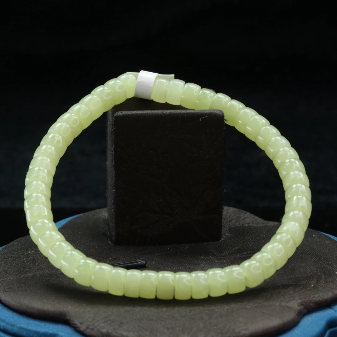 2和田玉若羌黄口手串/101199上海嘉禾拍卖