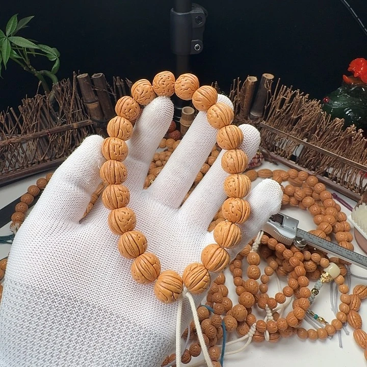 吊坠桃核野生桃核手持