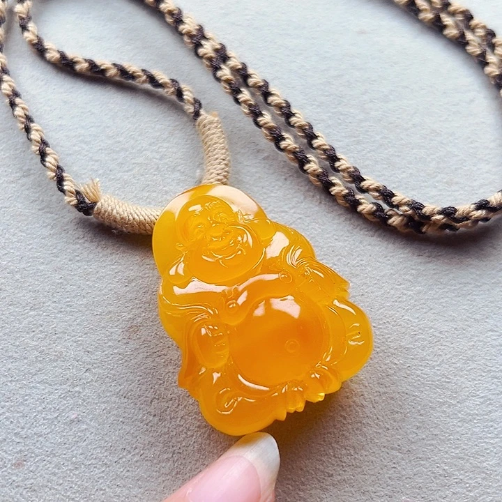 琥珀未镶嵌颈饰立体佛宝