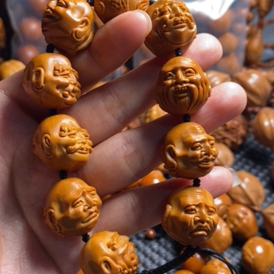 橄榄核吊坠老须派