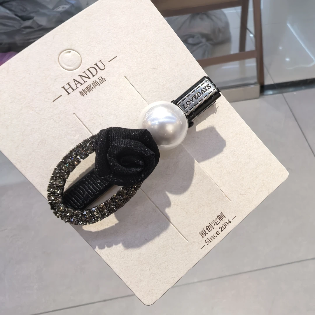 A472黑色玫瑰花椭圆闪闪边夹