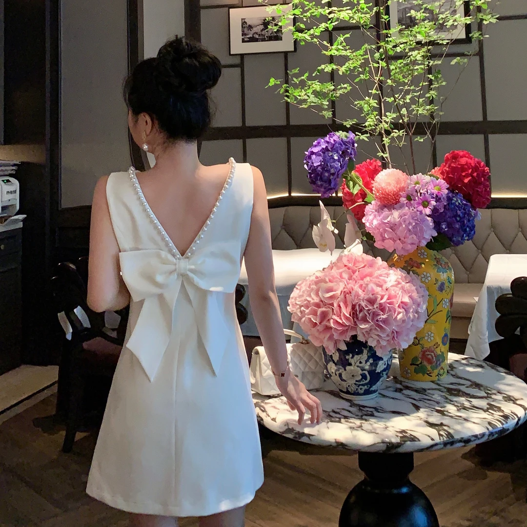 魅鹊 52155 露背蝴蝶结温柔白色派对礼服生日聚会洋气女神连衣裙