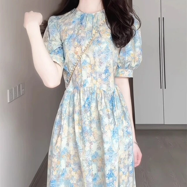 油画风碎花连衣裙女2025夏季韩版宽松显瘦短袖法式气质收腰长裙子