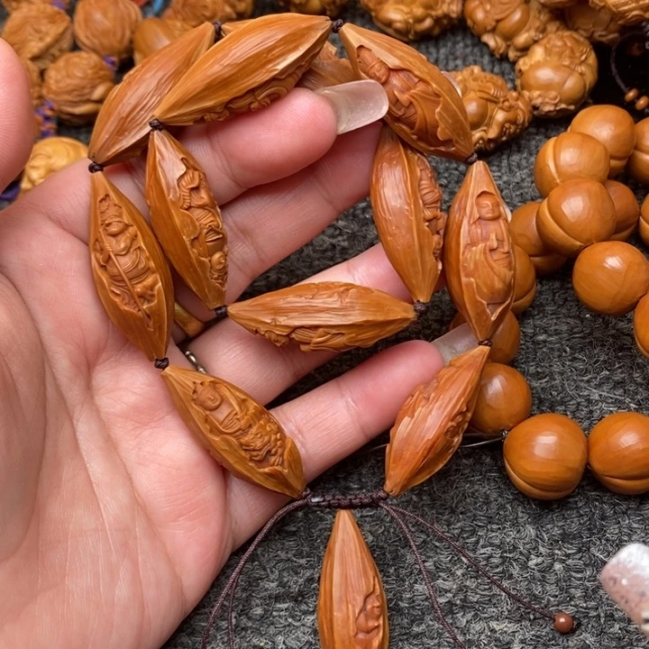 吊坠橄榄核哦啦啦啦啦健健康康快快乐乐