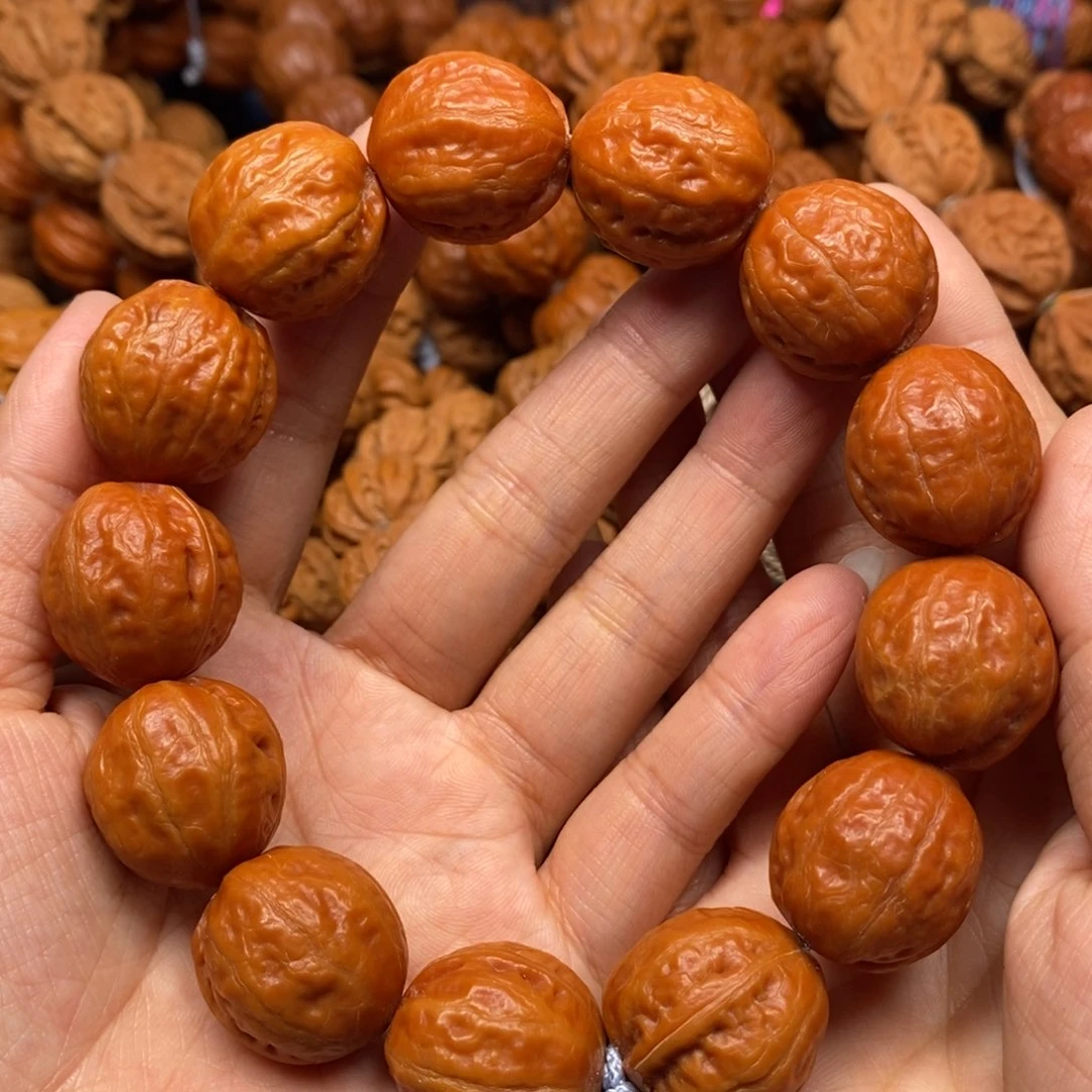 桃核手串郝****^光头富甲