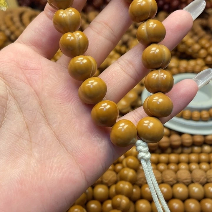 张***哥核桃微瑕亮面屁桃手持
