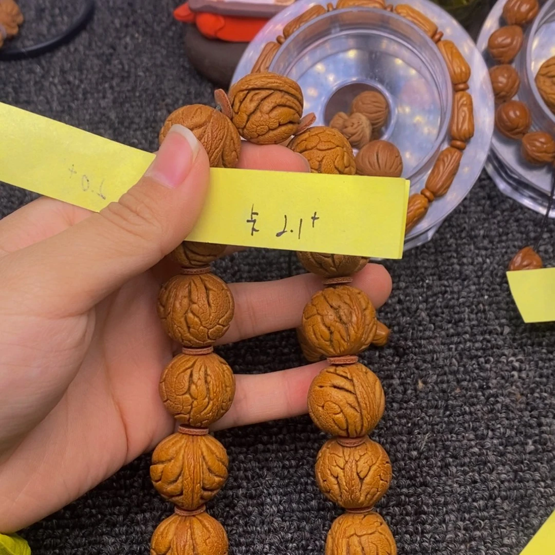 秦岭山脉龙纹桃核。13