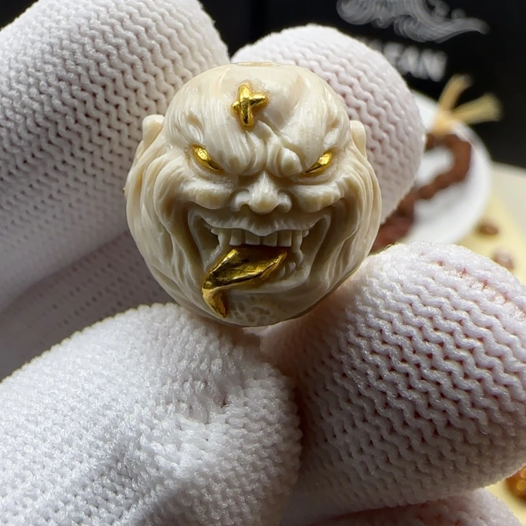 吊坠猴头核桃舔僧镶嵌24k
