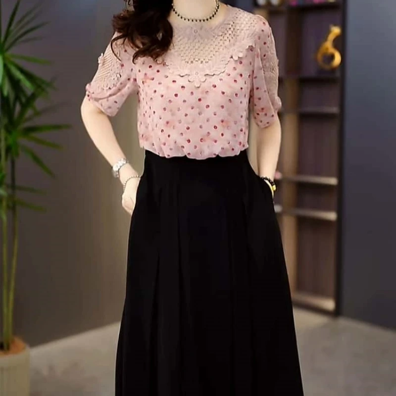 2025夏季新款时尚优雅气质显白粉色波点拼接修身显瘦中长款连衣裙