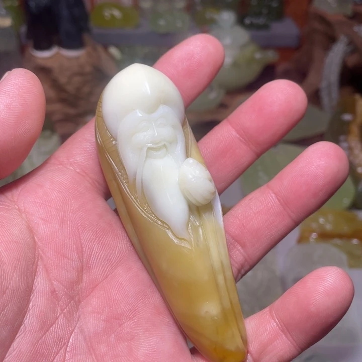 蛇纹石玉手把件未镶嵌菩**灯