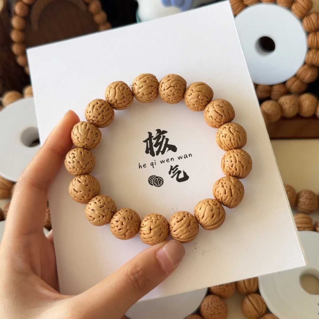 稳***的15➕黄皮金丹桃核吊坠