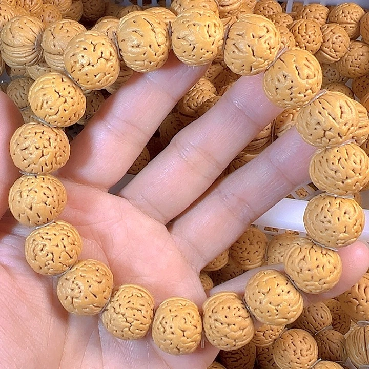 桃核吊坠盘锦奶豆