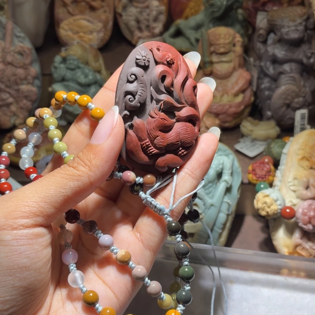 麦***糯石英质玉未镶嵌吊坠