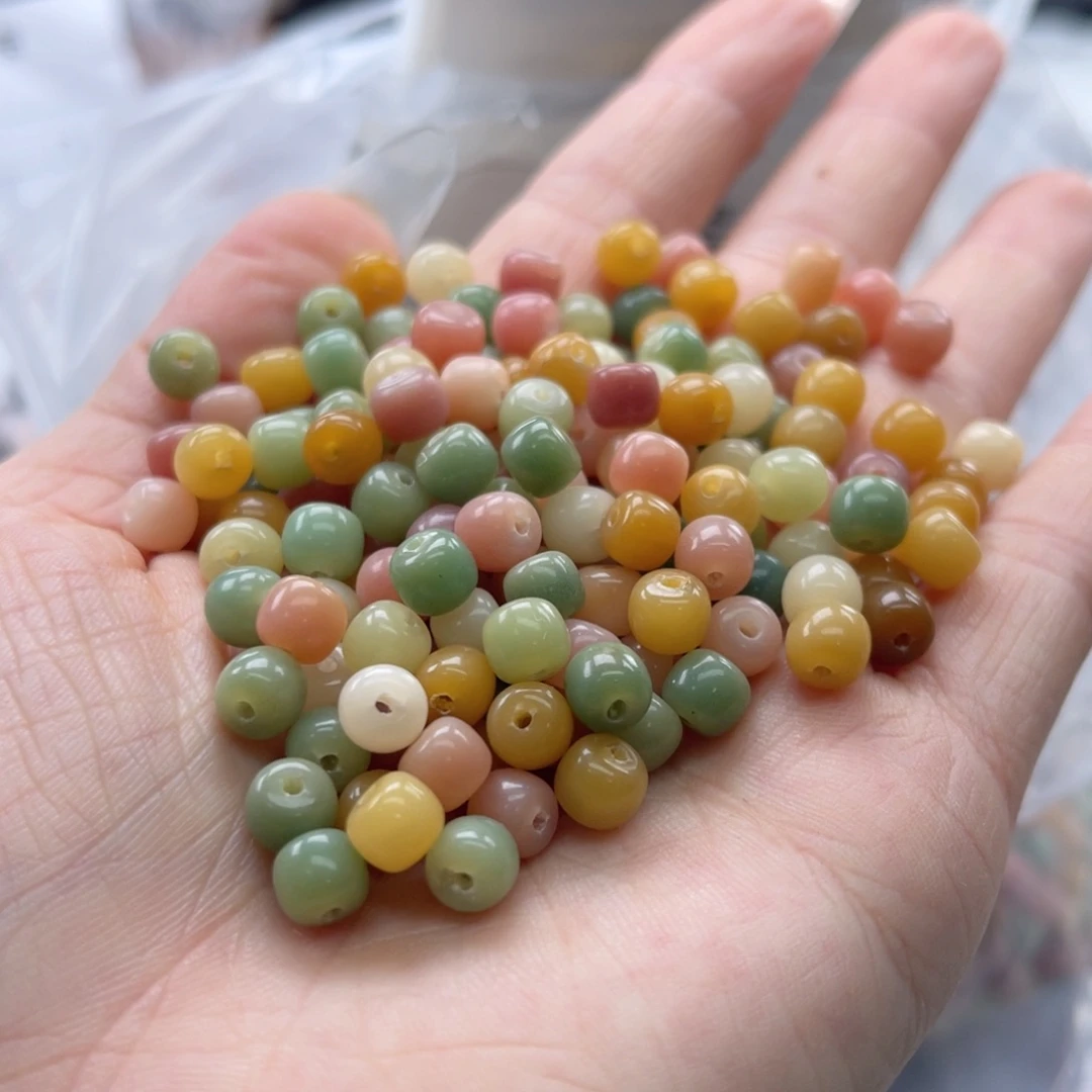 白玉菩提吊坠q5*6mm/100+10颗多宝桶珠