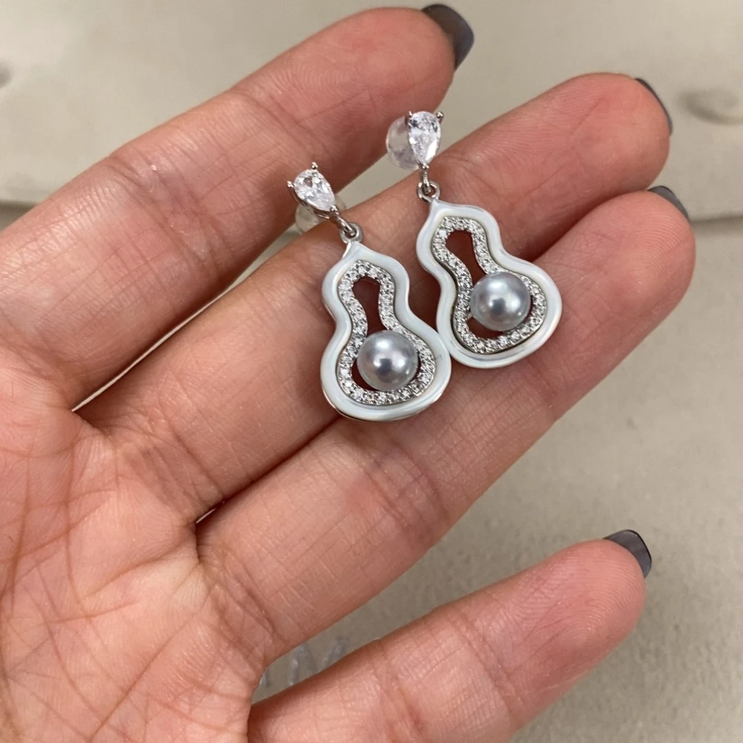 渔***n银S925镶嵌海水珍珠耳饰