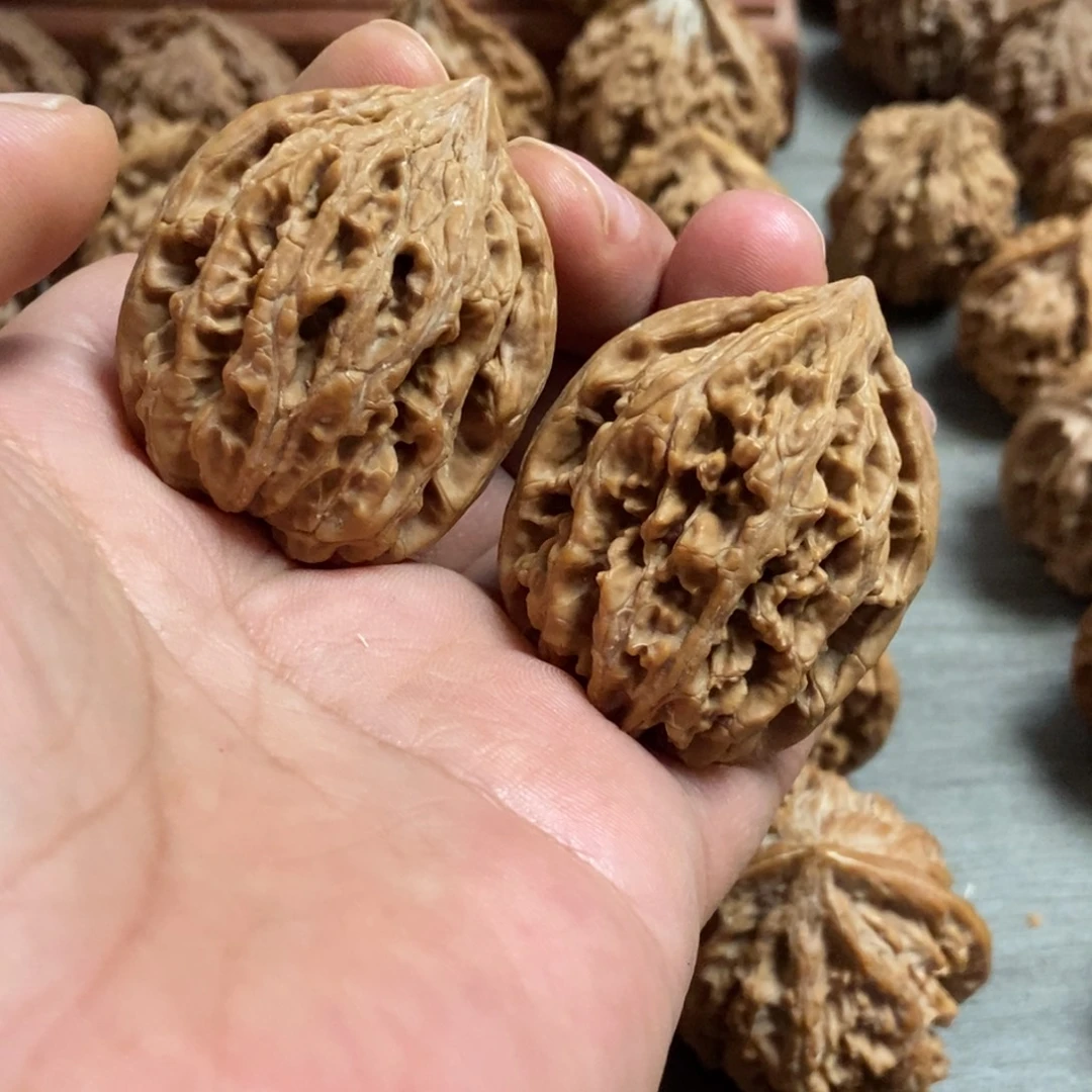 文玩核桃吊坠九龙筋36尺