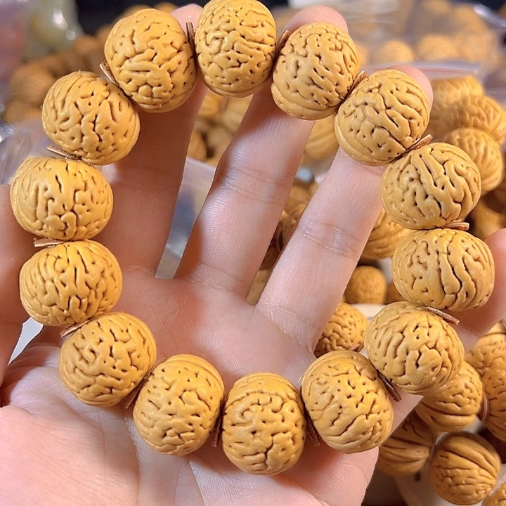 乱***”手串桃核国核大肌肉桃核手串