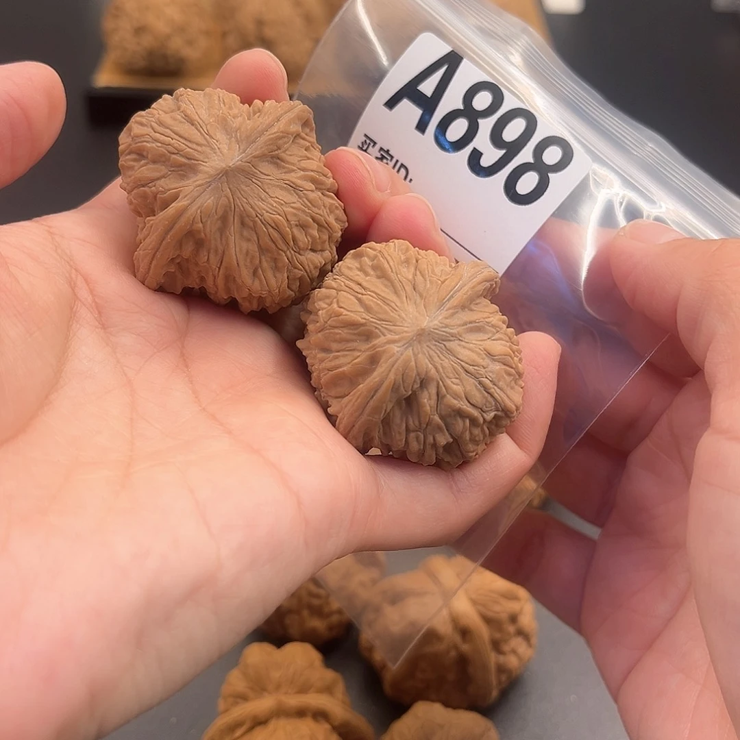 桃核把件因*报磨盘39