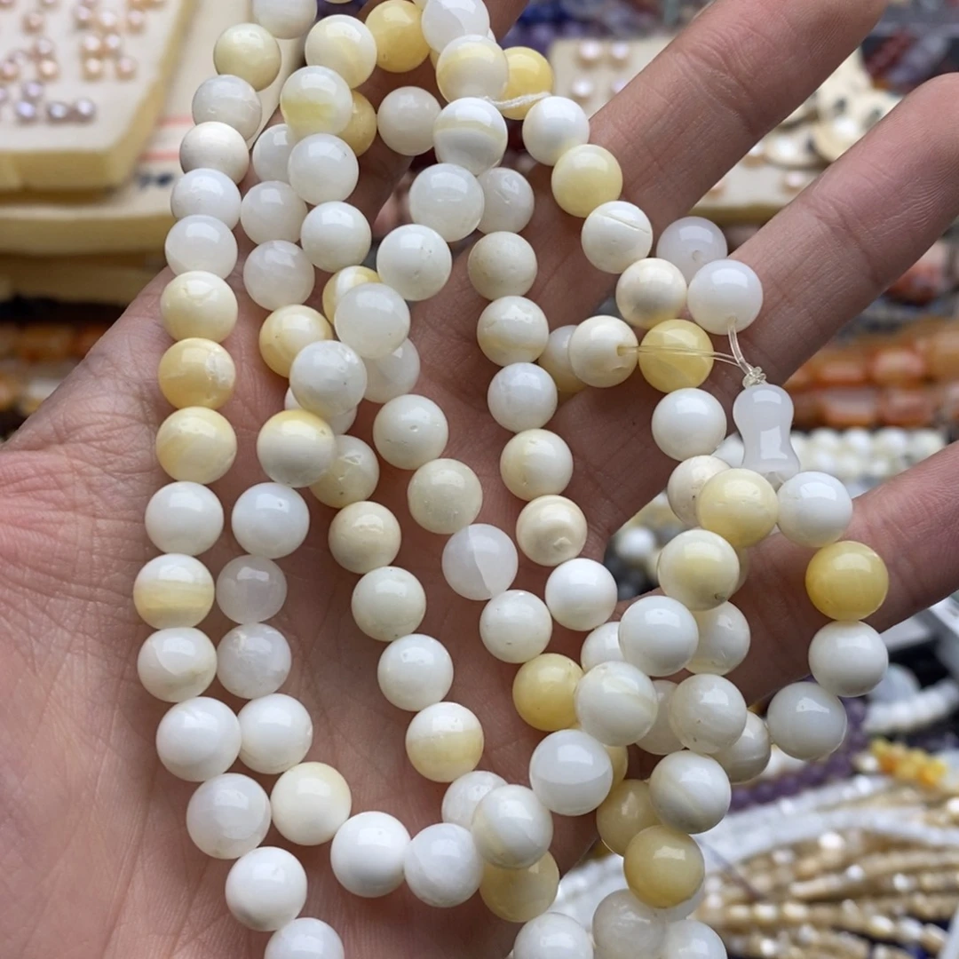 玛瑙/玉髓未镶嵌珠宝半成品一条有瑕金车贝壳8mm108颗多圈