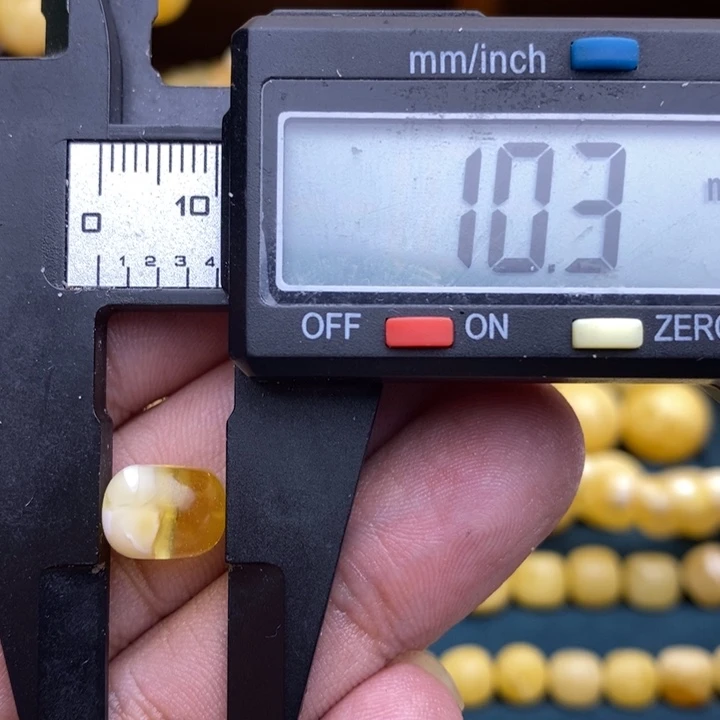 琥珀未镶嵌裸石56号10.2*7.7喇叭口微瑕