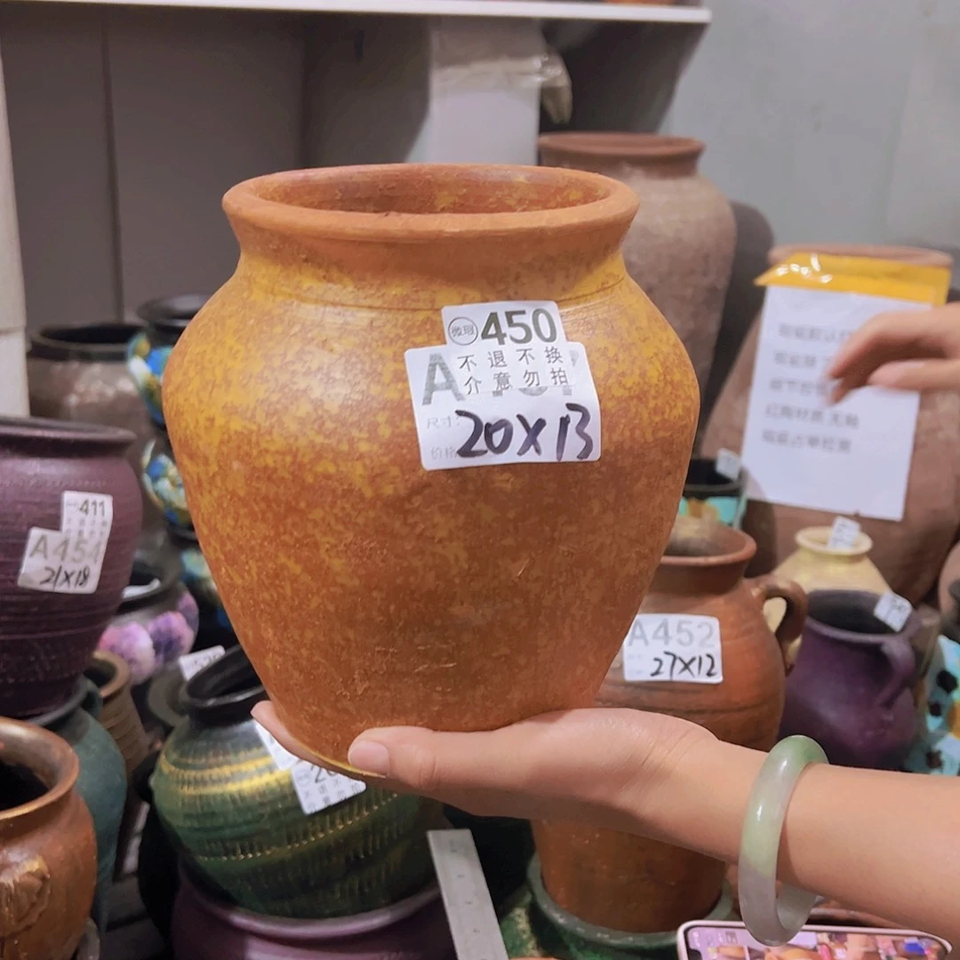 瑕疵黄色坛子有孔450