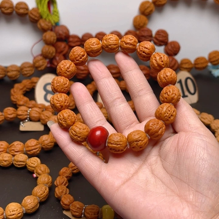 文玩核桃吊坠T****p核桃手串