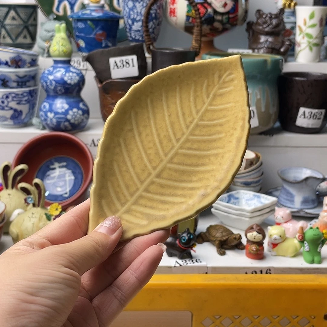 瓷片神****爱哈哈哈了笑拉