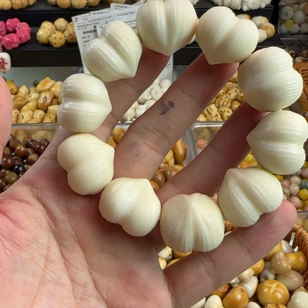 吊坠菩提根/象牙果微瑕疵拉丝屁桃手串一条