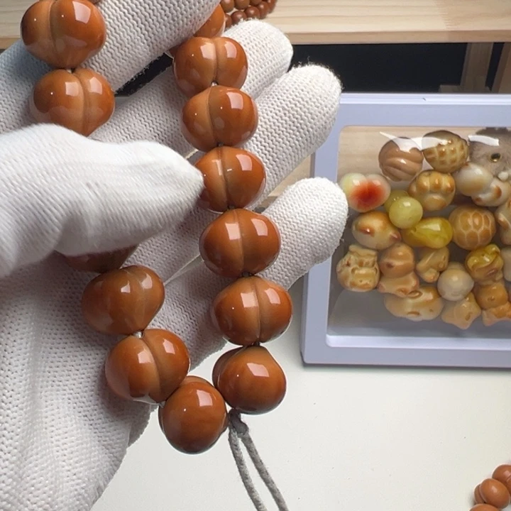 ****࿐猴头核桃手串猴头