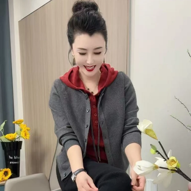 9905假两件针织女装针织宽松型长袖假两件款时尚毛针织衫连帽洋气