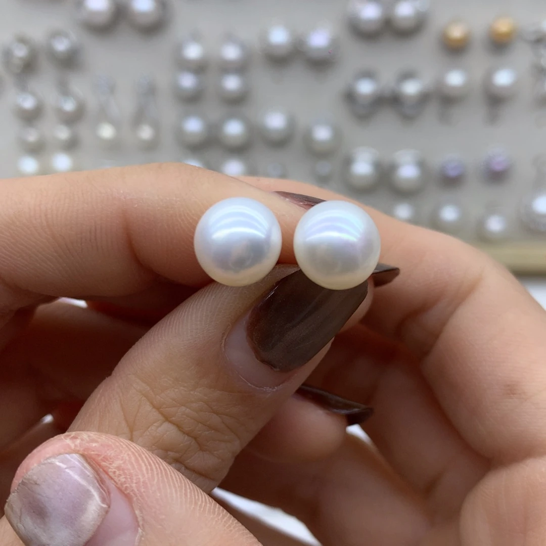 淡水珍珠耳饰银S925镶嵌落***。