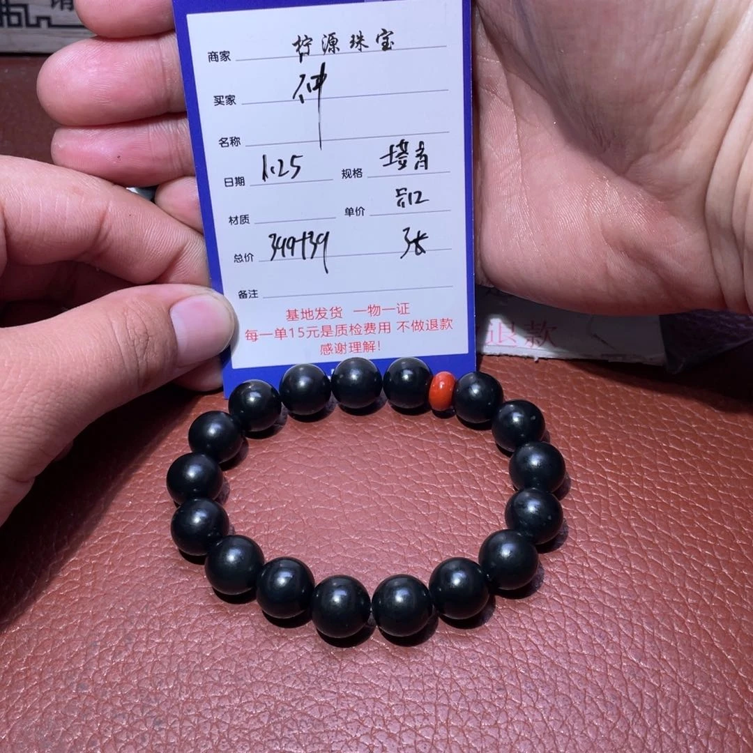 和田玉手串未镶嵌神**刀