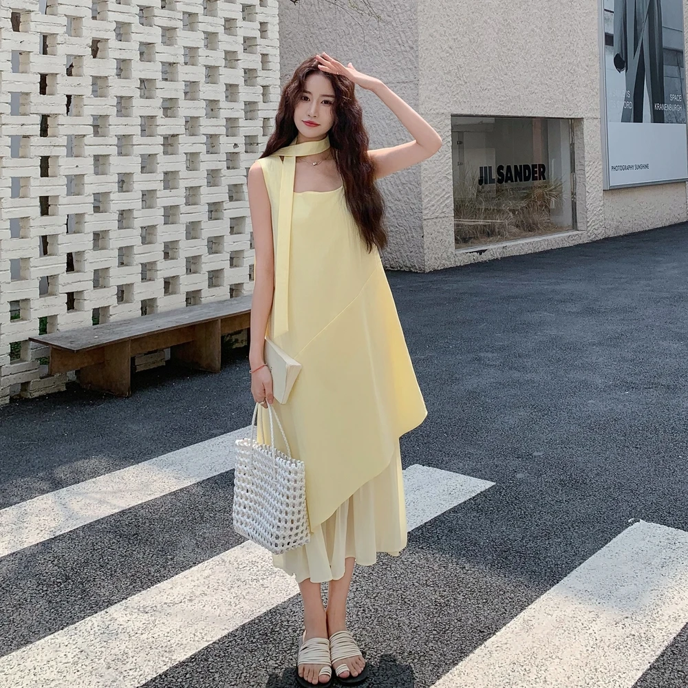 黄色连衣裙女2025年夏季新款收腰显瘦轻奢高级感简约假两件长裙子
