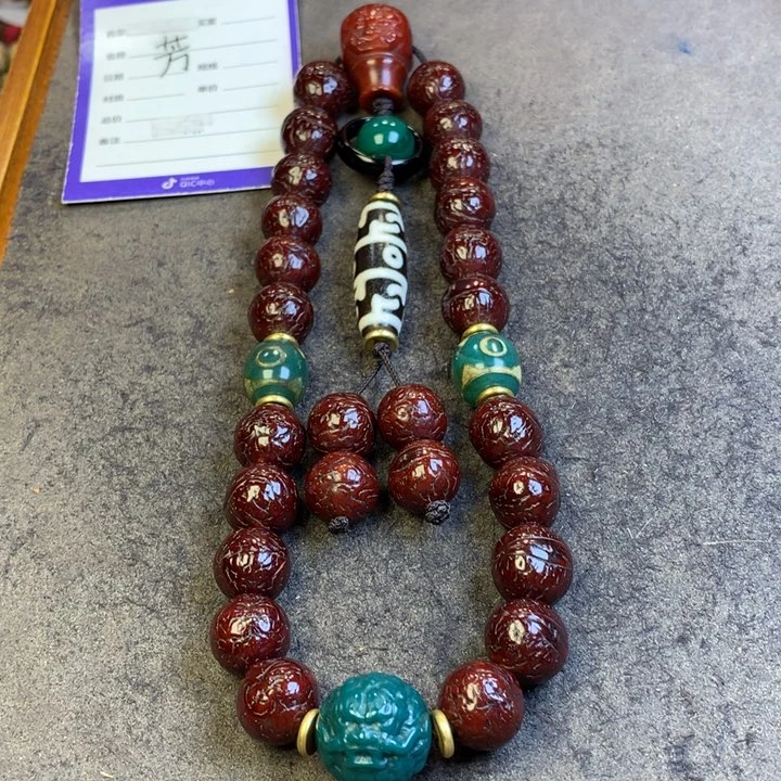 凤眼菩提吊坠手持